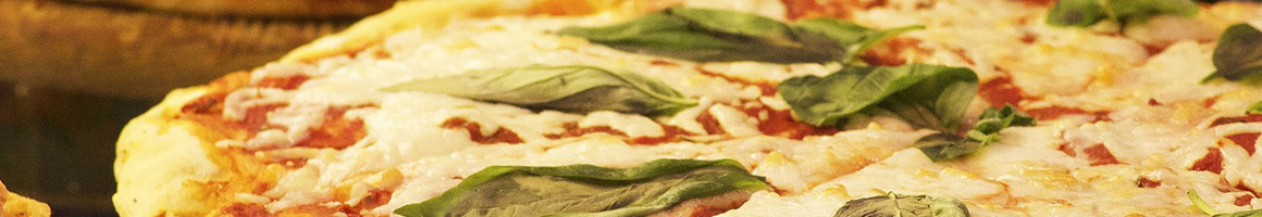 Eating Pizza at Vinny's Pizzeria restaurant in Herkimer, NY.